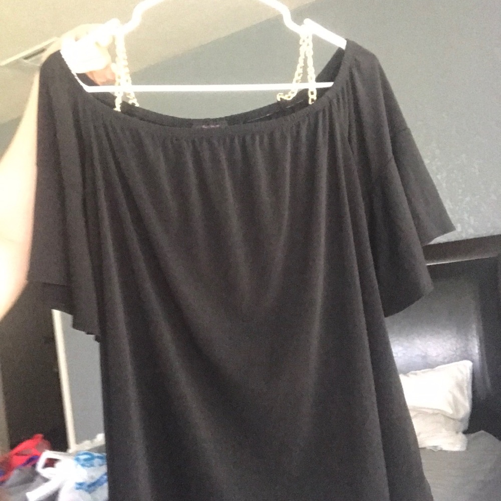 Brand new. Black with gold chain straps